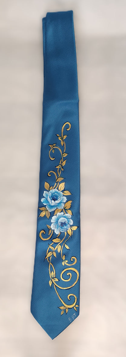 Cravatta blu con ricami in oro