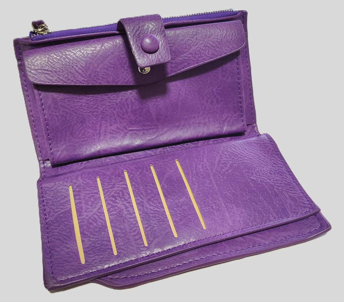 Portafoglio viola con peonie e non ti scordar